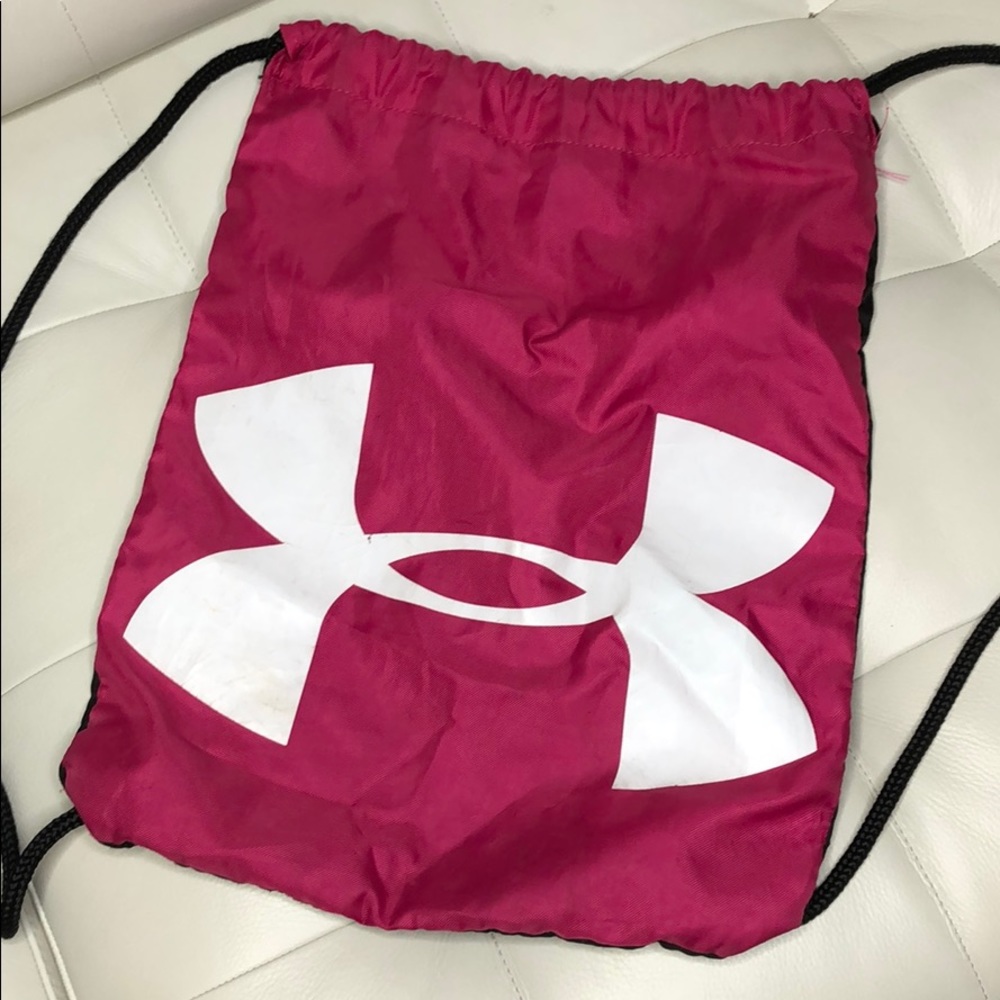 Pink and black Under Armour drawstring bag